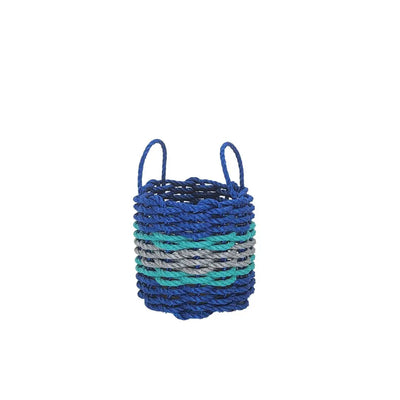 Handmade storage basket woven from blue, light gray, and teal lobster rope