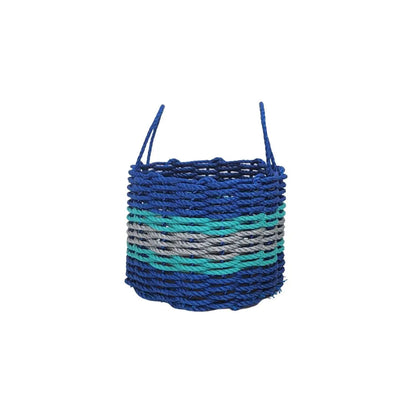 Handmade storage basket woven from blue, light gray, and teal lobster rope