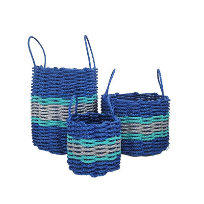 Handmade storage basket woven from blue, light gray, and teal lobster rope