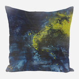 Square pillow with an abstract dark blue background and bright yellow and green paint splatters creating a dynamic pattern.