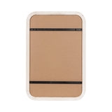 Rear view of a rectangular pinboard with rounded corners, featuring a white frame and two horizontal black metal hanging brackets on a plain brown backing.