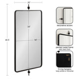 Rectangular wall mirror with satin black painted metal frame, rounded corners, decorative finials at top and bottom, and D-ring hangers for vertical or horizontal mounting.