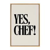 Framed canvas print with bold black text saying 'YES, CHEF!' on a plain cream background.