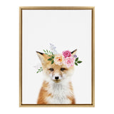 Framed canvas artwork of a red fox with a floral crown of pink and peach flowers and green leaves on a white background.