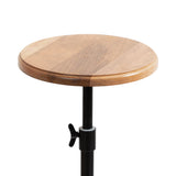 Round wooden table top with visible wood grain on black adjustable metal stand with wing nut for height adjustment.