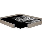 Close-up of a minimalist black and white tiger portrait print in a light wood frame with a mitered corner, against a white background.