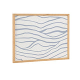 Wall art print featuring simple, elegant wavy gray lines on a white background, framed in light natural wood, evoking coastal wave patterns.