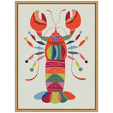 Stylized lobster illustration with colorful geometric and organic shapes in orange, red, green, blue, and purple, framed in natural wood on a light background.
