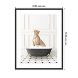 Cheetah sitting inside a classic black clawfoot bathtub with white bubbles, set against a white paneled wall and black-and-white tiled floor.