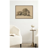 Sepia-toned framed canvas print of clustered trees in a meadow, hanging centered above a tall brass side table with a white vase and dried flowers, flanked by two cream textured chairs