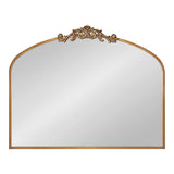 Rectangular arch mirror with ornate gold floral carving at the top center and a thin gold frame around the edges.