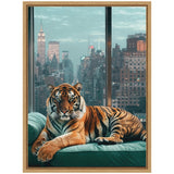 A relaxed tiger with vivid orange and black stripes lounges on a teal cushion by a large window showing a detailed New York City skyline at dusk.