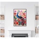 Framed colorful canvas print featuring a stylized blue peacock with detailed feathers surrounded by vibrant pink, orange, and green floral patterns on a light background, hung above a white fireplace.