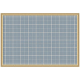 Framed Fabric Pinboard with light blue plaid geometric pattern on wall with pins and notes
