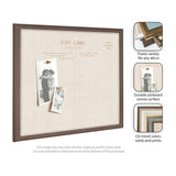 Rectangular linen fabric pinboard with a dark wood frame, displaying two vintage-style black and white postcard photos pinned with thumbtacks