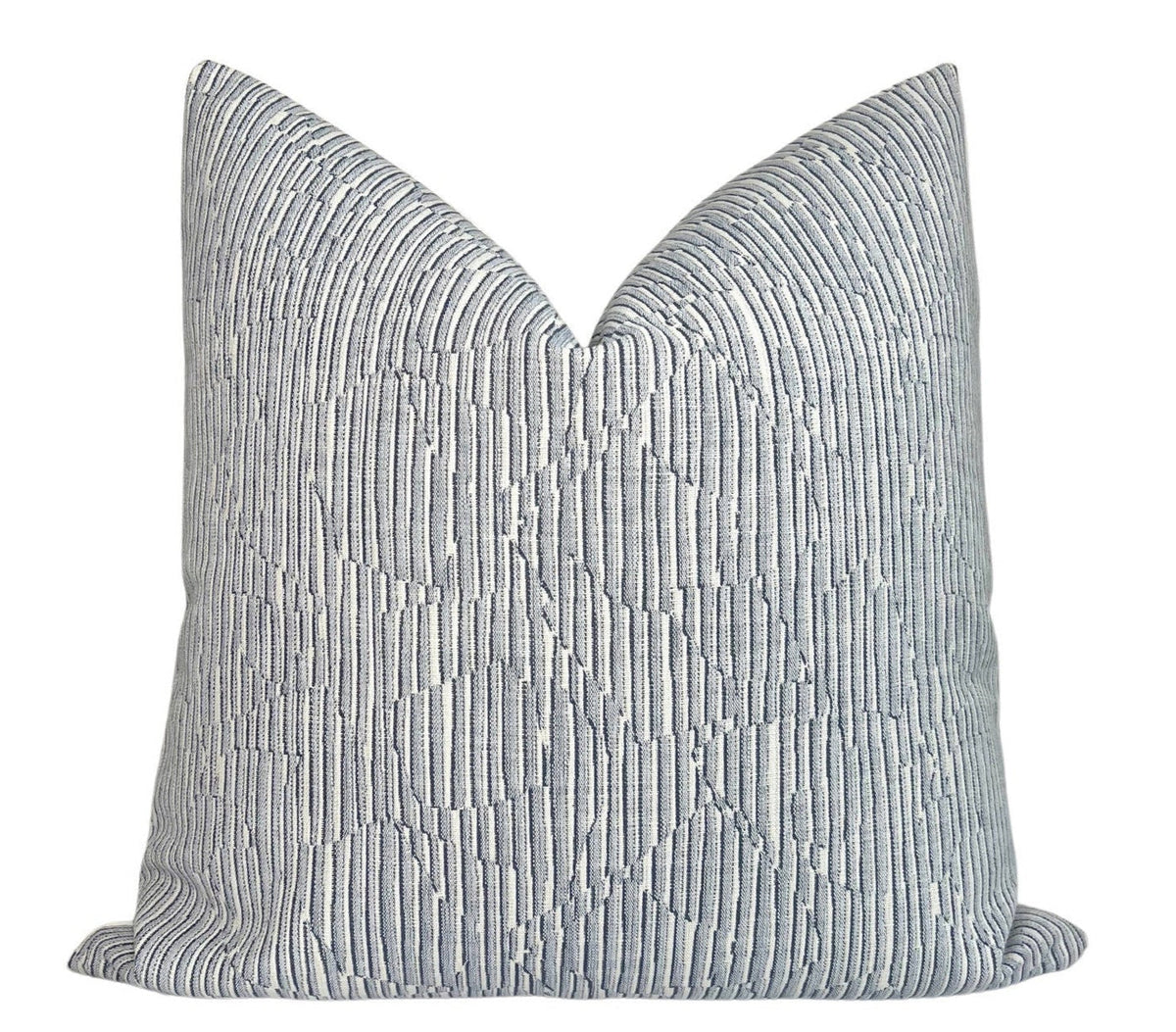 Cadence Striped Pillow Cover in Denim Blue displaying blue striped woven fabric on the front and ivory outdoor fabric backing