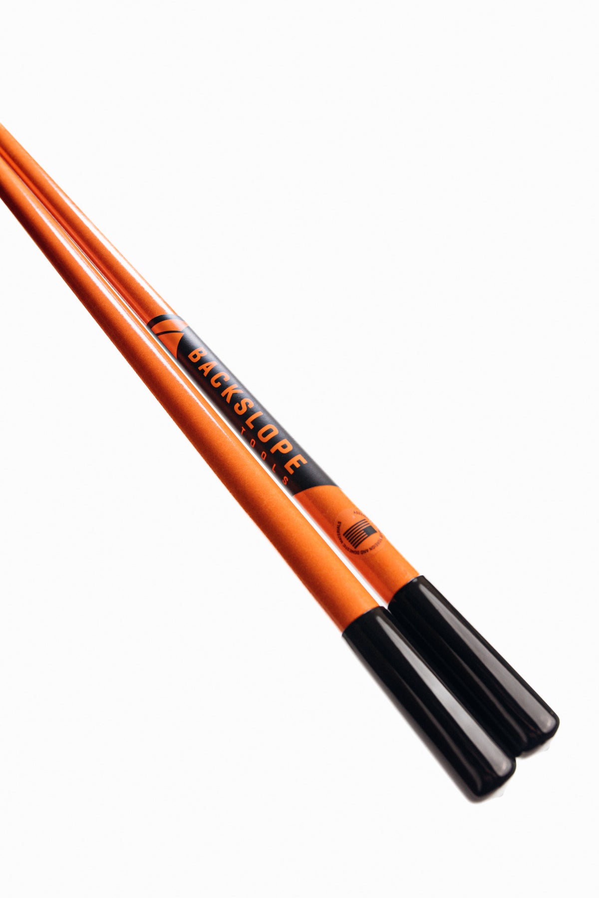 Carry Bars by Backslope Tools shown as long handles attached to carry heavy load