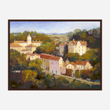 Impressionist style painting of a village with light-colored buildings, red roofs, and a prominent church tower surrounded by lush green trees under a blue sky.
