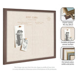 Rectangular linen fabric pinboard with dark brown wooden frame displaying vintage black-and-white photos pinned on the left side and postcard-style print on the right