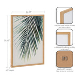 Framed botanical palm leaf print in a natural oak wood frame with minimalist gallery profile, measuring 12.65 by 16.65 inches, featuring sawtooth hangers for vertical or horizontal display.