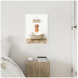 Framed canvas of a golden retriever sitting in a cream clawfoot bathtub with bubbles, under a wooden sign reading 'Hot Bath $1.00,' hanging against white shiplap walls.