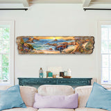 Long, narrow wooden wall art depicting a coastal scene with rocky cliffs, a winding road, and a vintage brown car at sunset, featuring warm earth tones and blue ocean waves.