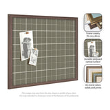 Square pinboard with sage green plaid fabric and thin white grid lines in a medium brown wooden frame, shown with two pinned black-and-white photos.