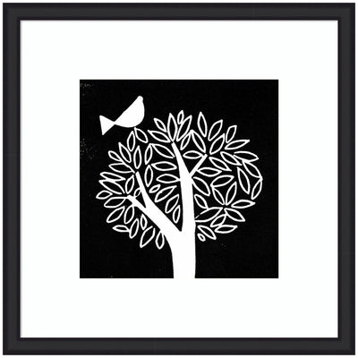 Framed black and white linocut print of a stylized tree with a bird on a branch
