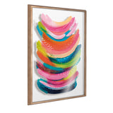 Framed abstract art print with layered brushstrokes in pink, orange, blue, green, and yellow, accented by small white and gold dotted patterns on white background.