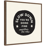 Framed canvas wall art with black and white positive quote 'Slow Down You're Doing Fine' by Lucky Guava in Sylvie walnut brown frame
