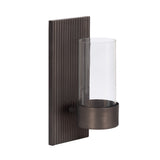 Vertical ribbed dark metal rectangular wall plate with attached cylindrical glass holder and metal cup base for candle or light.