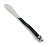 Butter spreader with a curved black handle and a matte silver blade, featuring a rounded end and three silver rings near the handle's tip