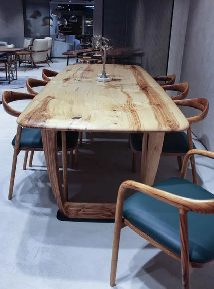 Rustic solid chestnut wood dining table with chestnut legs showing natural grain and knots
