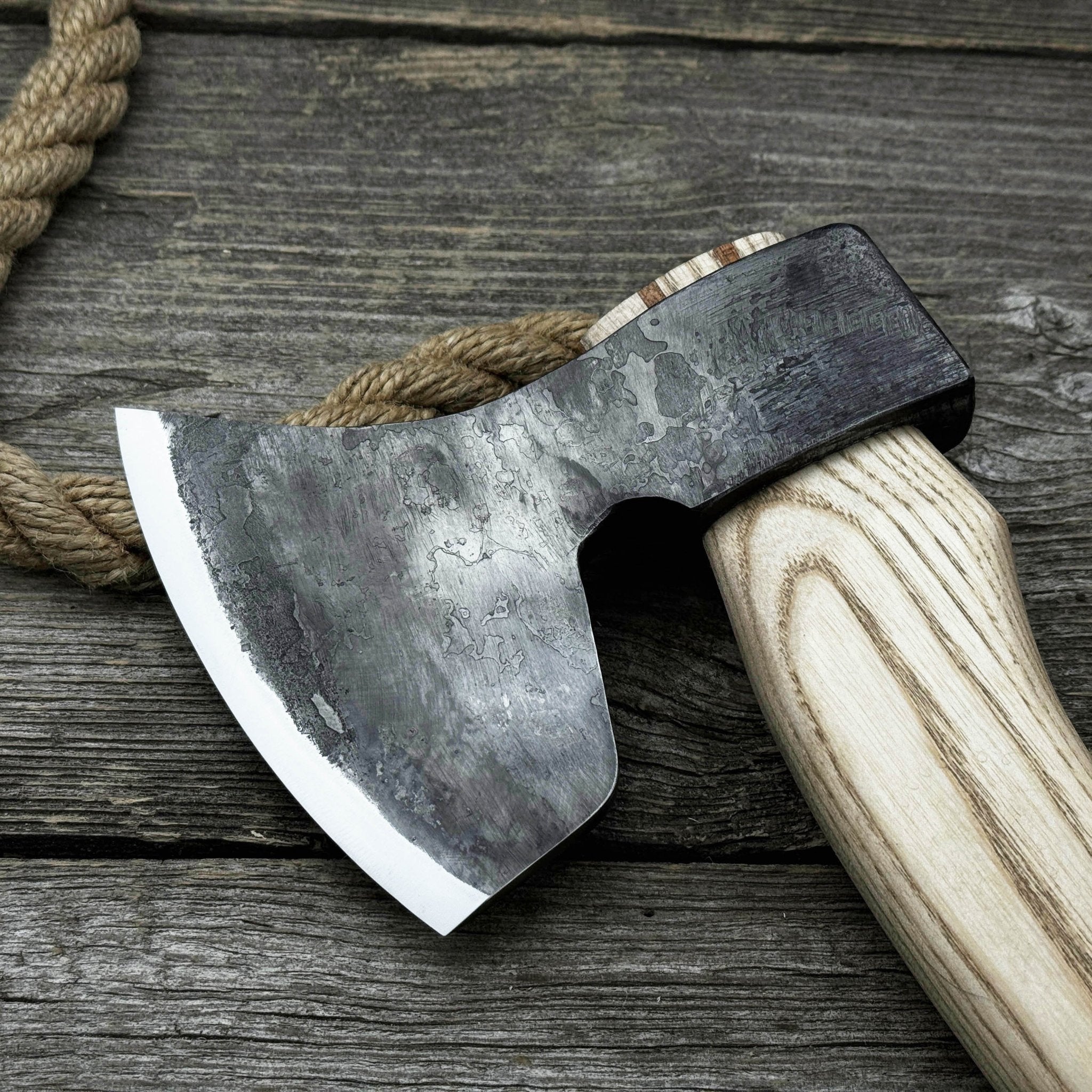 Hand-forged chopping axe with ash wood handle and leather back carry pouch