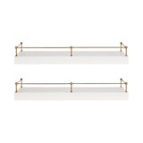 Two rectangular white floating shelves with slim brass-colored metal railings along the back and sides, shown on a white background.