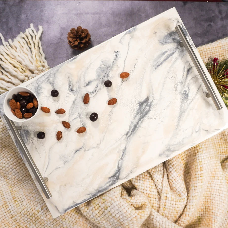 Marble Acrylic Resin Serving Tray with fish fillets and nuts on a textured surface