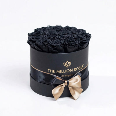 Classic Black Box featuring 14-15 black roses in a contemporary black box