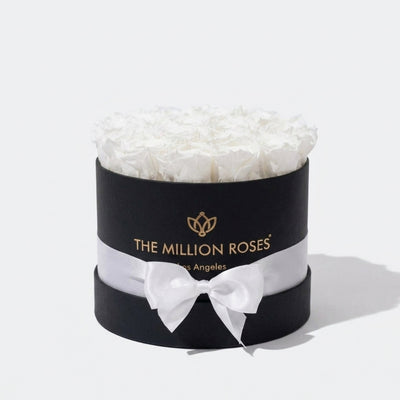 Classic Black Box with 14-15 white preserved roses arranged in a black square box