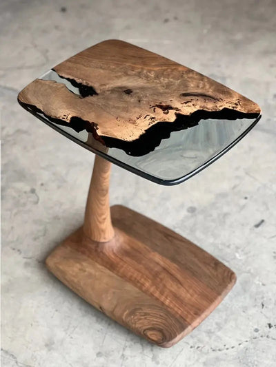 C-shaped luxury resin end table made of solid walnut wood with clear epoxy resin finish