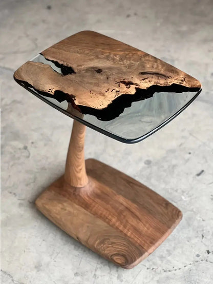 C-shaped luxury resin end table made of solid walnut wood with clear epoxy resin finish