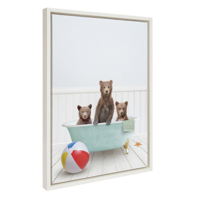 Framed canvas art showing three bear cubs enjoying a bath in a cozy beach house setting