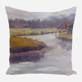 Decorative pillow featuring an impressionist-style landscape of a pond with muted green and brown grasses, a red-roofed structure, and hazy mountains in the background.
