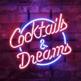 Coctails&Dreams Neon Sign Light glowing with vibrant pink neon on a metal grid backing