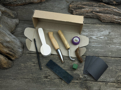 Complete Spoon Carving Kit for Beginners with knives, wooden blank, sandpaper, and sharpening board