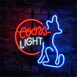 Neon sign with red Coors text inside a red circle, white Light text below, and a blue outline of a howling coyote on a dark brick wall.