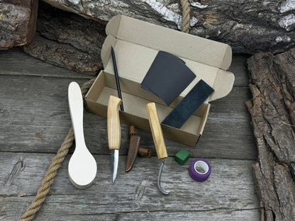 All-in-one wooden spoon whittling kit with knives, wooden blank, sandpaper, and sharpening tools