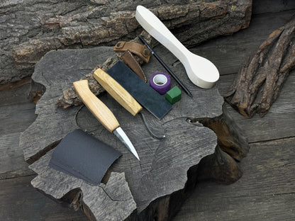 All-in-one wooden spoon whittling kit with knives, wooden blank, sandpaper, and sharpening tools