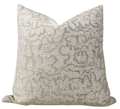 Crescendo Pillow Cover showcasing raised velvet fabric in ivory taupe on front and ivory linen back