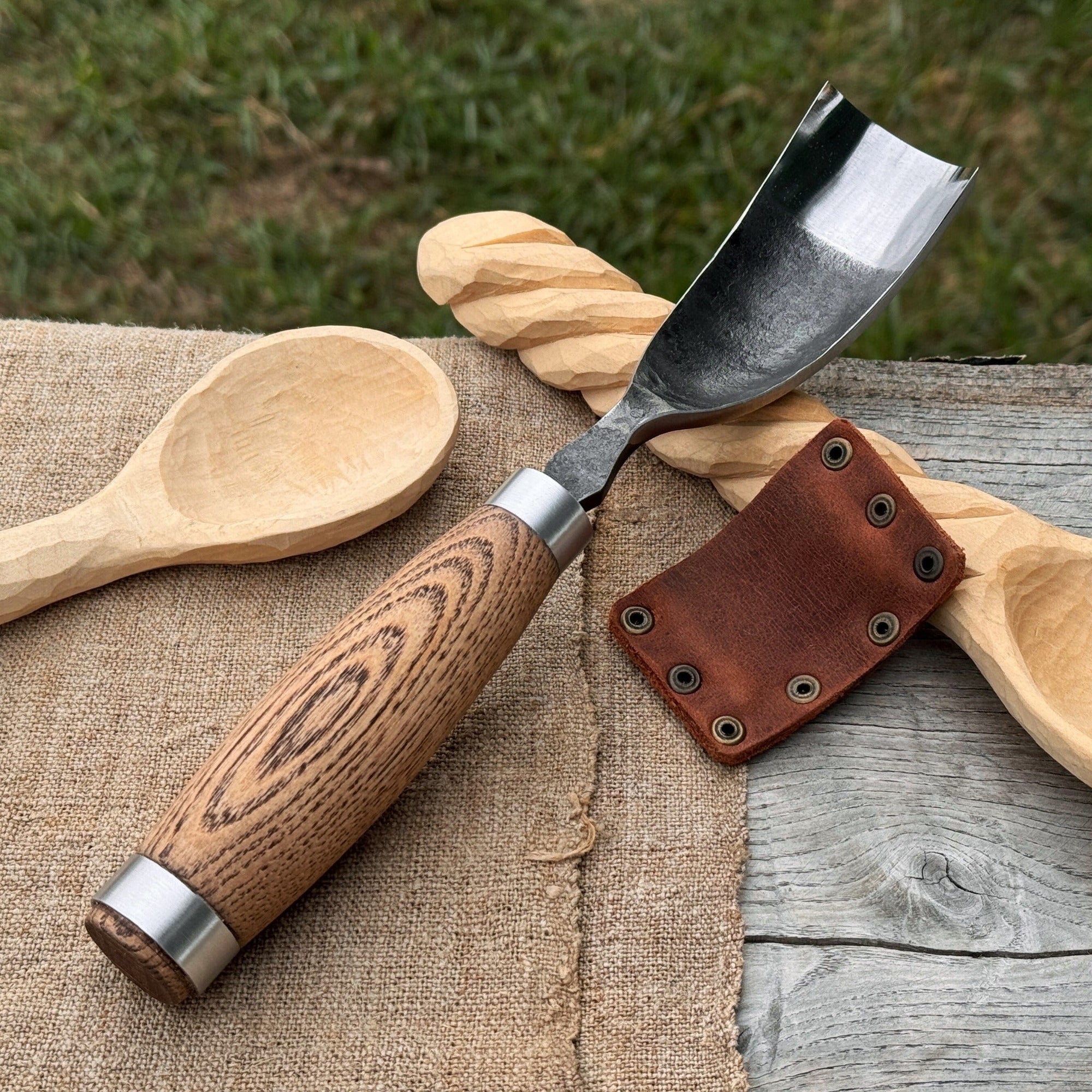 Hand-forged curved bowl gouge with ash wood handle for wood carving