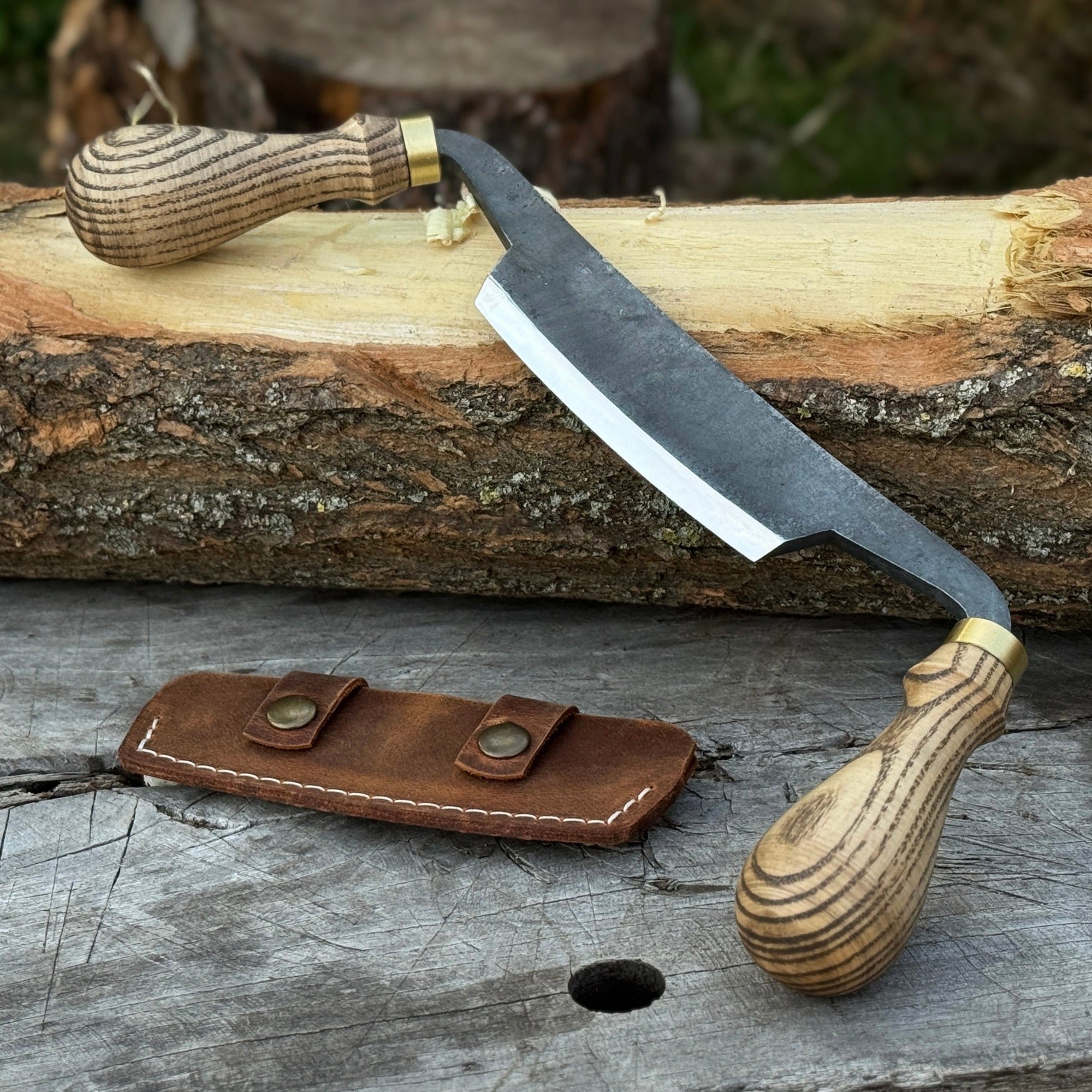 Curved draw knife with 10.5 cm cutting edge and ash wood handle by Sharky Forged Steel Tools